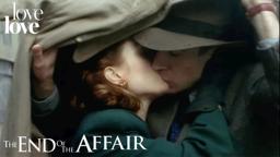 Sarah and Maurice Kiss In The Rain
