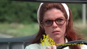 The Lady in the Car with Glasses and a Gun
